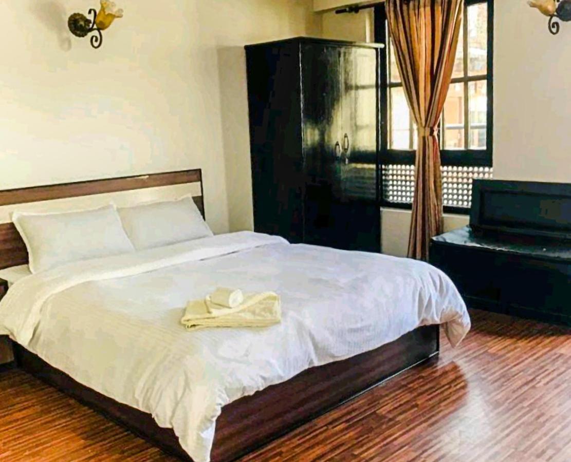 רומינדיי Buddha Palace Restaurant By Wb Inn מראה חיצוני תמונה